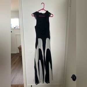 Black and white cocktail dress with tags still attached.